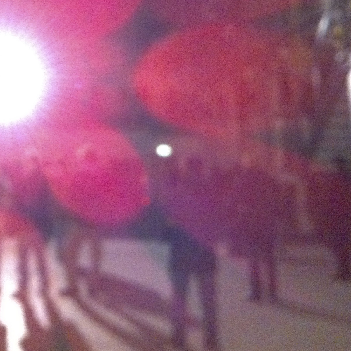 A blurred picture of people in an industrial space